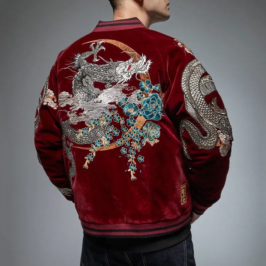 Red velvet jacket with a silver dragon embroidery, surrounded by blue floral accents and traditional Asian design elements.